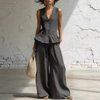 Women's bohemian sleeveless ruffled tank top and casual pants set by FitiqueFit, featuring relaxed fit and stylish ruffle details.