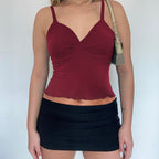 Women’s backless camisole tank by FitiqueFit featuring a bow detail and waist-defining fit, perfect for casualwear.