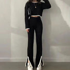 Women’s casual color-block two-piece set by FitiqueFit, featuring a relaxed top and matching pants in vibrant color blocks.