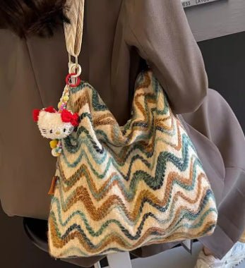 Women’s casual ethnic-style embroidered crossbody shoulder bag, featuring colorful embroidery and a compact design.