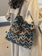 Ethnic-style embroidered women's crossbody shoulder bag with casual design, featuring colorful patterns and a compact, stylish look.
