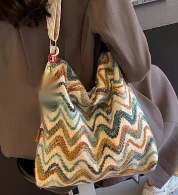 Embroidered ethnic-style women's crossbody shoulder bag with casual design and colorful embroidery details.