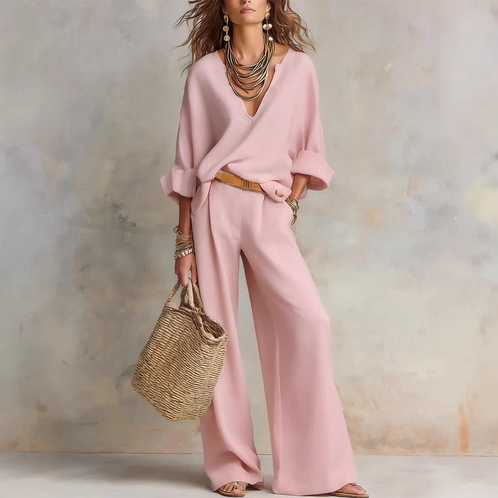 Women's casual linen vacation set with three-quarter sleeve top and full-length pants by FitiqueFit, perfect for relaxed summer days.