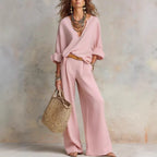 Women's casual linen vacation set with three-quarter sleeve top and full-length pants by FitiqueFit, perfect for relaxed summer days.