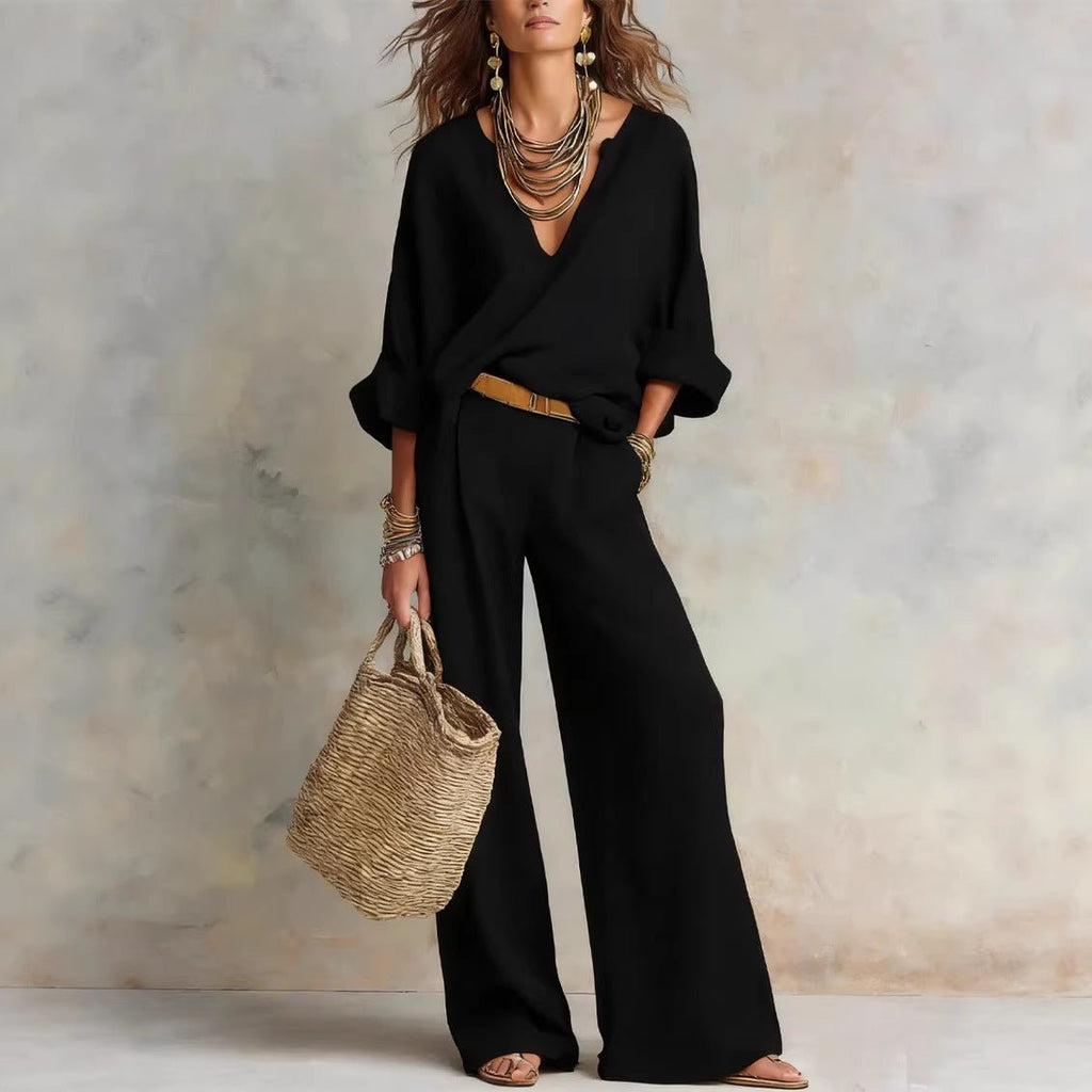 Women's casual linen vacation set by FitiqueFit with three-quarter sleeve top and full-length pants, perfect for relaxed wear.