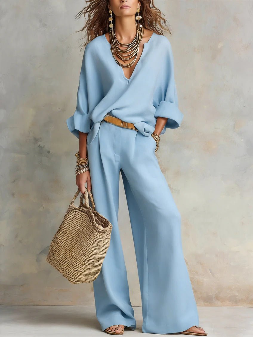 Women's casual linen vacation set from FitiqueFit, featuring a three-quarter sleeve top and full-length pants in a relaxed style.