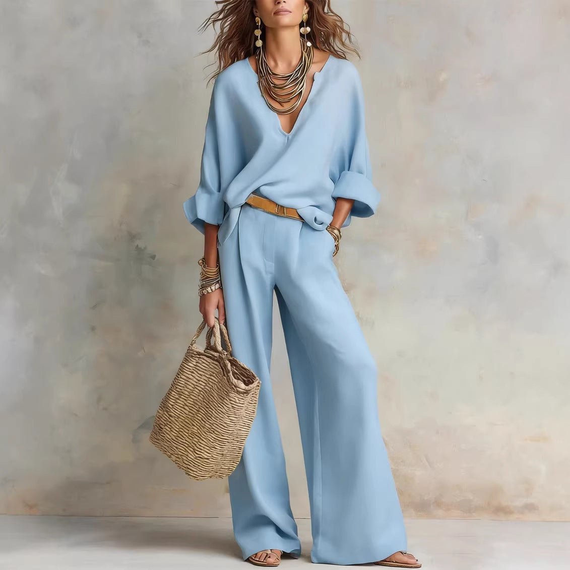 Women's casual linen vacation set by FitiqueFit, featuring a three-quarter sleeve top and full-length pants in a relaxed style.
