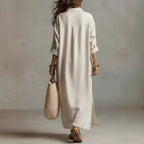 Women's casual linen shirt dress with long sleeves and relaxed fit, by FitiqueFit, shown on a model in a comfortable, stylish outfit.