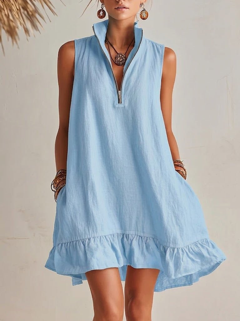 Women's casual loose half-zip sleeveless dress with ruffle hem by FitiqueFit, showing the relaxed fit and stylish ruffle detail.