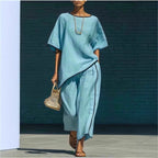 Women's casual resort loose short-sleeve top and pants set by FitiqueFit, featuring comfortable fabric and relaxed fit.