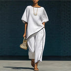 Women's casual resort loose short-sleeve top and pants set by FitiqueFit, featuring lightweight fabric and relaxed fit for comfortable style.