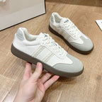 Women's casual slip-on shoes by FitiqueFit featuring comfortable design and neutral color, perfect for everyday wear.