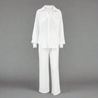 Women's casual solid color lounge set by FitiqueFit, featuring a comfortable top and matching pants in a relaxed fit.