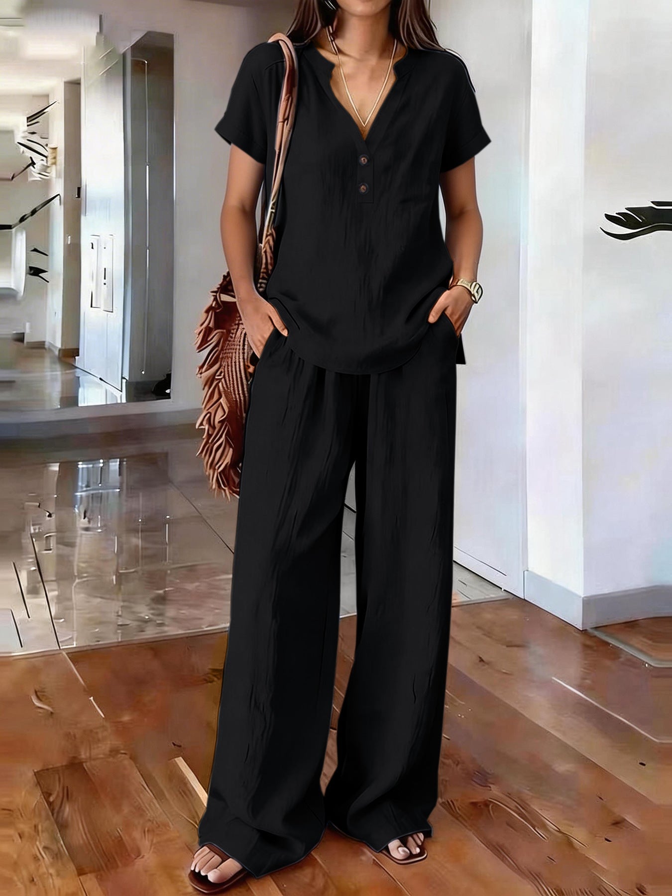 Women's casual two-piece solid color set by FitiqueFit, featuring a relaxed top and matching pants for comfortable casual wear.