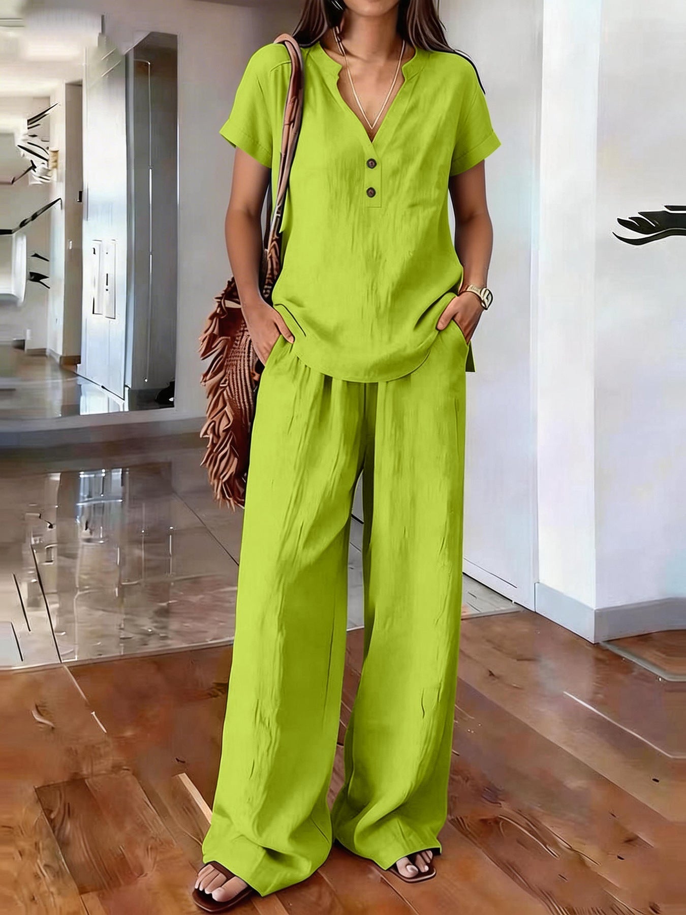 Women’s casual solid color two-piece set by FitiqueFit featuring a relaxed top and matching pants, perfect for everyday wear.