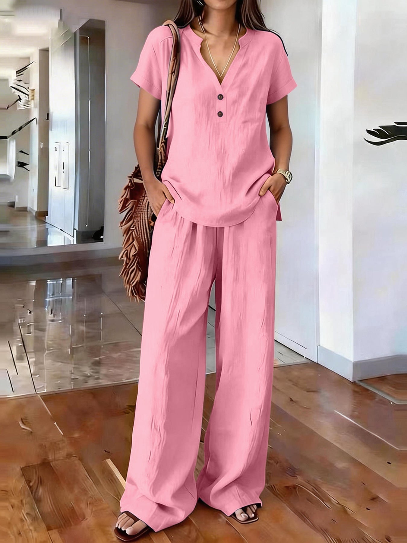 Women’s casual solid color two-piece set by FitiqueFit, featuring a relaxed top and matching pants perfect for everyday wear.