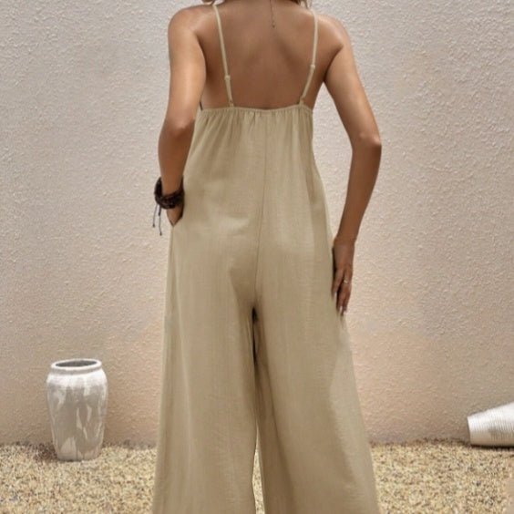 Women's casual suspender jumpsuit by FitiqueFit, sleeveless V-neck solid color one-piece, perfect for relaxed everyday wear.