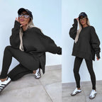 Women’s casual sweater suit with loose split top and fitted trousers from FitiqueFit, featuring a relaxed and stylish look.