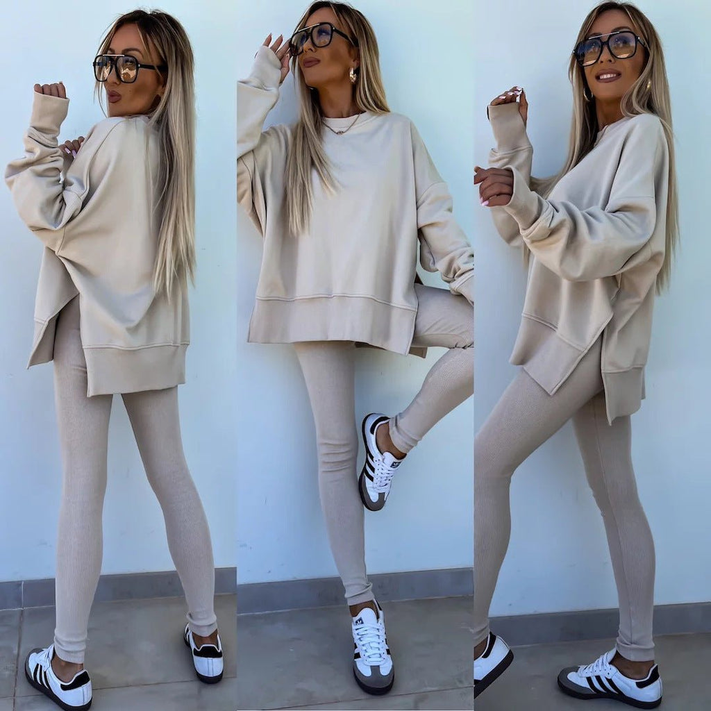 Women’s casual sweater suit by FitiqueFit featuring a loose split top and fitted trousers, perfect for relaxed everyday wear.