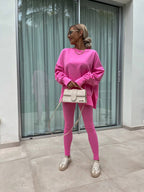 Women’s casual sweater suit by FitiqueFit featuring a loose split top and fitted trousers, perfect for comfortable everyday wear.