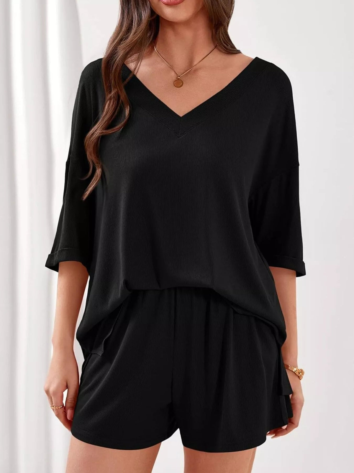 Women's casual V-neck top and shorts set, solid color two-piece outfit, stylish and comfortable clothing by Plush Fashion Hub.
