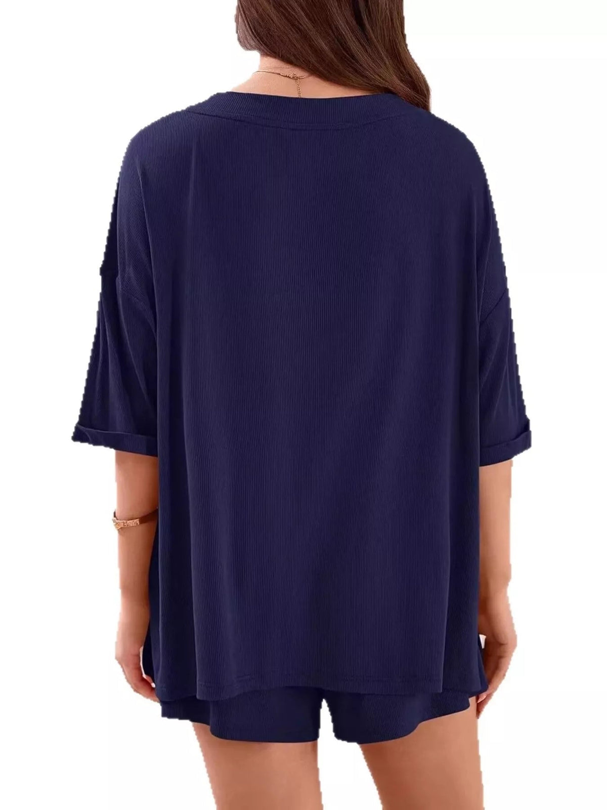 Women's casual V-neck top and shorts set by Plush Fashion Hub, solid color two-piece outfit for relaxed everyday wear.