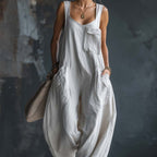 Women’s casual FitiqueFit solid color loose jumpsuit, relaxed fit with short sleeves and wide legs, perfect for everyday wear.