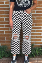 Women's checkerboard print distressed raw edge cropped jeans by Trendsi, featuring a fashionable checkerboard pattern and raw hem detail.