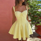 Women’s cinched puffy strap casual dress by FitiqueFit featuring a fitted waist and puffed shoulder straps.