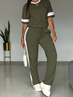 Women's color-block contrast 2-piece casualwear set by FitiqueFit, featuring a stylish top and matching pants.