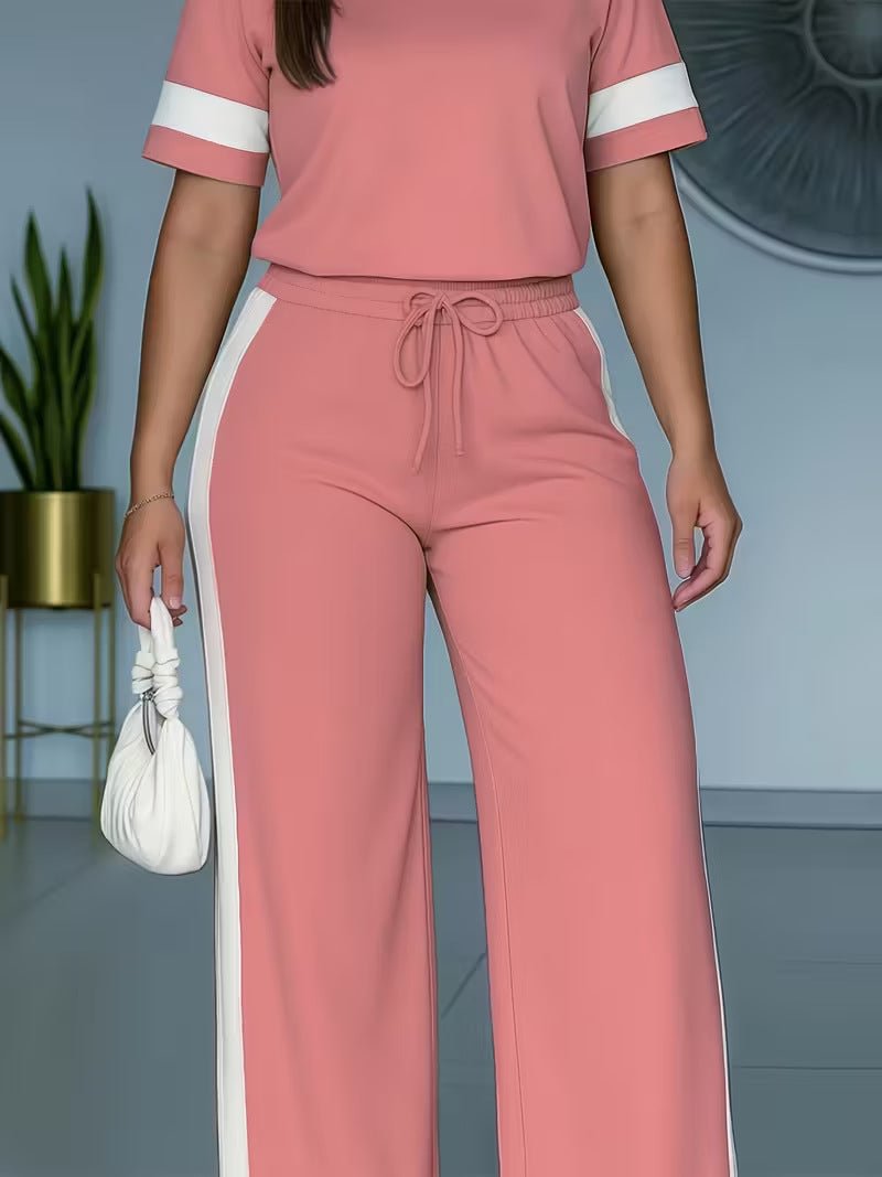 Women's color-block contrast 2-piece casual outfit by FitiqueFit, featuring a stylish top and matching pants set.