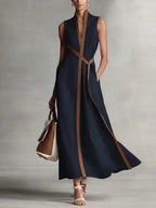 Women's color block sleeveless linen blend dress with stand collar, casualwear by FitiqueFit, shown on a model.