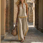 Women’s contrast color sleeveless vest and wide-leg pants casualwear set by FitiqueFit, featuring stylish sleeveless top and flowing pants.