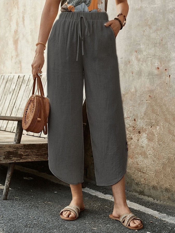 Women's cotton-linen cropped drawstring pants by FitiqueFit, casualwear with a relaxed fit and adjustable waistband.