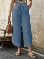 Women's cotton-linen cropped drawstring pants by FitiqueFit, casualwear with relaxed fit and comfortable waistband.