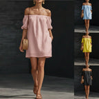 Women’s cotton-linen off-shoulder puff-sleeve loose mini dress, casualwear by FitiqueFit, displayed on a model outdoors.
