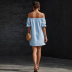 Women's cotton-linen off-shoulder puff-sleeve loose mini dress, casualwear by FitiqueFit, shown on a model in a relaxed pose.