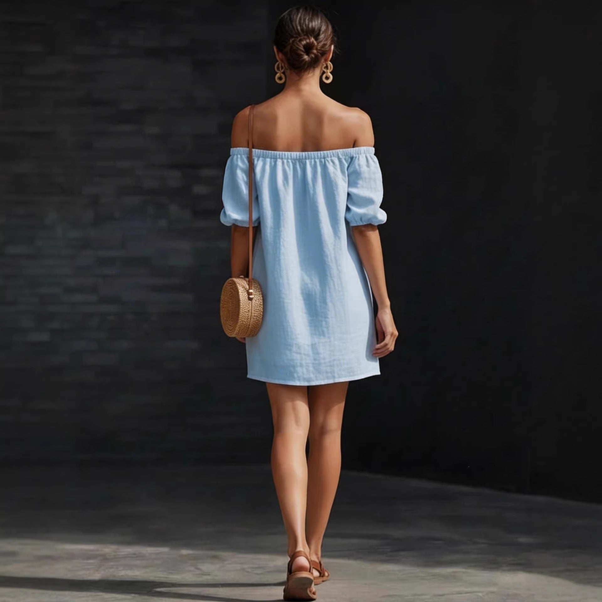 Women's cotton-linen off-shoulder puff-sleeve loose mini dress, casualwear by FitiqueFit, shown on a model in a relaxed pose.