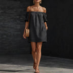 Women's cotton-linen off-shoulder puff-sleeve loose mini dress, casualwear by FitiqueFit, displayed on a hanger.