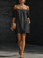 Women's cotton-linen off-shoulder puff-sleeve loose mini dress by FitiqueFit, shown on a model with a relaxed, casual style.