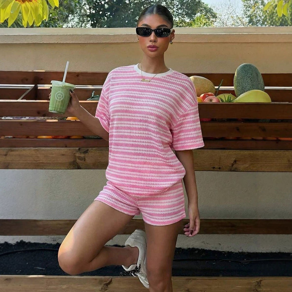 Women's casual FitiqueFit crew-neck spliced short-sleeve T-shirt and matching shorts set, featuring a stylish color block design.