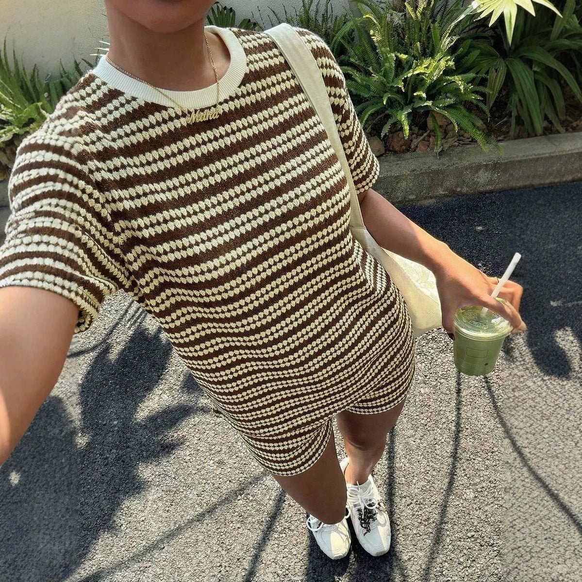 Women's casual FitiqueFit crew-neck spliced short-sleeve T-shirt and shorts set, featuring a stylish color-block design and comfortable fit.