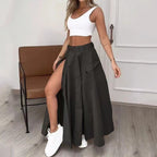 Women’s cropped vest and high-waisted slit skirt matching set by FitiqueFit, casualwear style, shown on a model.