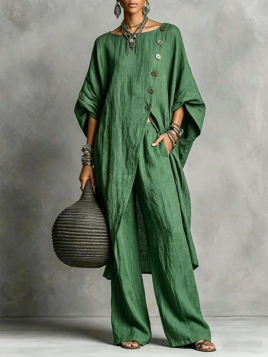 Women's casual wear set by FitiqueFit featuring a drop shoulder three-quarter sleeve irregular shirt and matching pants.