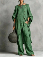 Women's casual wear set by FitiqueFit featuring a drop shoulder three-quarter sleeve irregular shirt and matching pants.