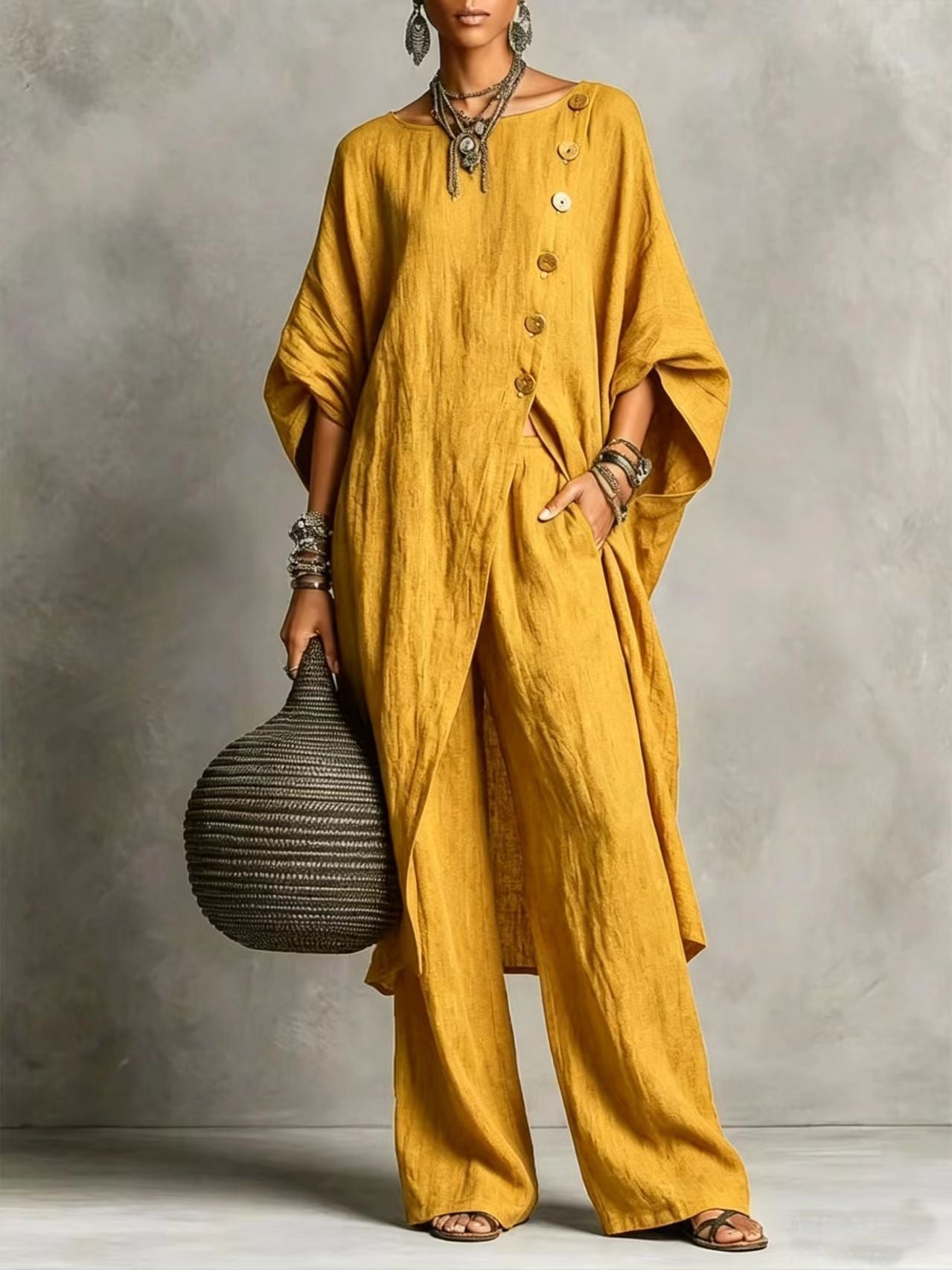 Women's casualwear set with drop shoulder three-quarter sleeve irregular shirt and matching pants by FitiqueFit.