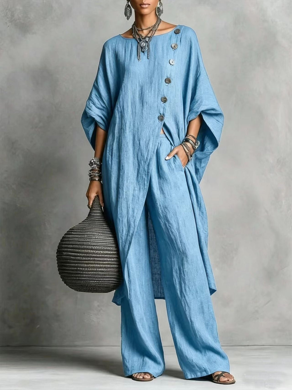 Women's casual drop shoulder three-quarter sleeve irregular shirt and pants set by FitiqueFit, featuring relaxed fit and stylish design.