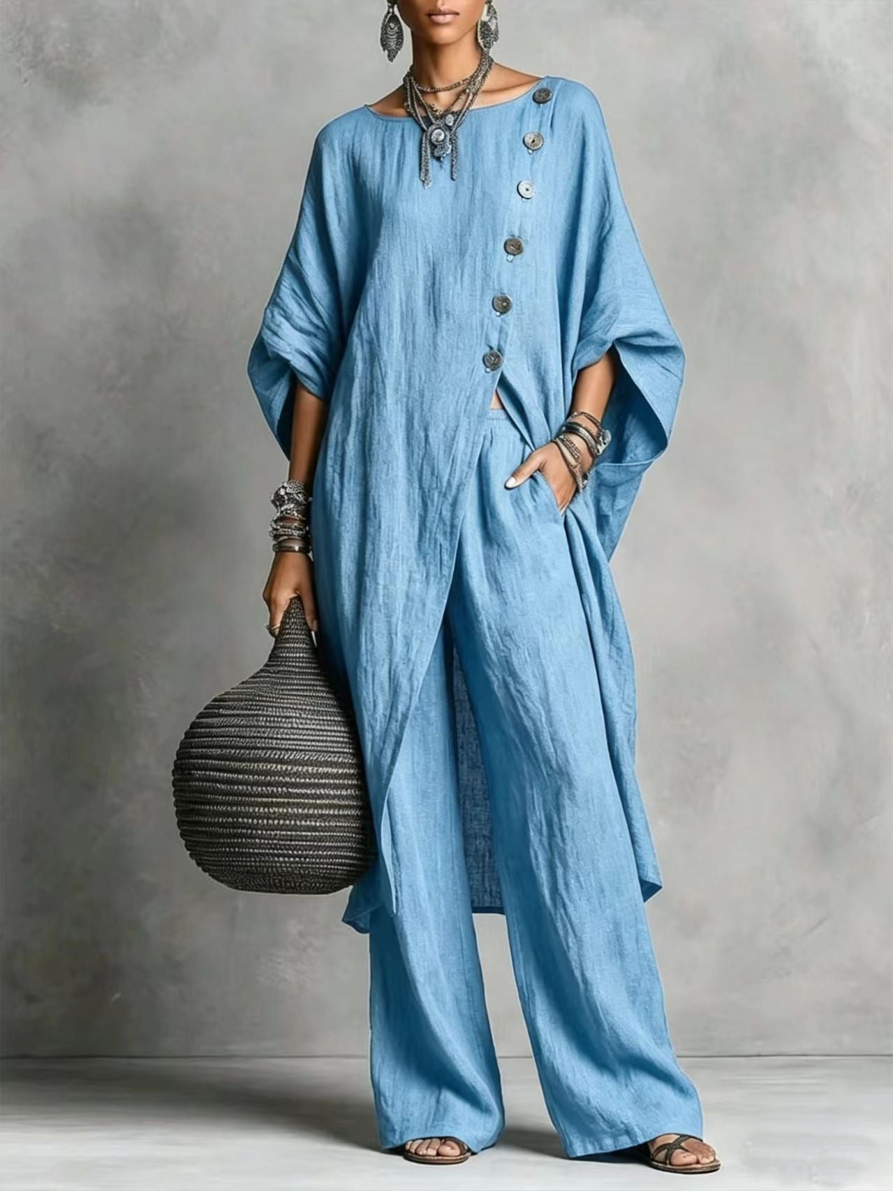 Women's casual drop shoulder three-quarter sleeve irregular shirt and pants set by FitiqueFit, featuring relaxed fit and stylish design.