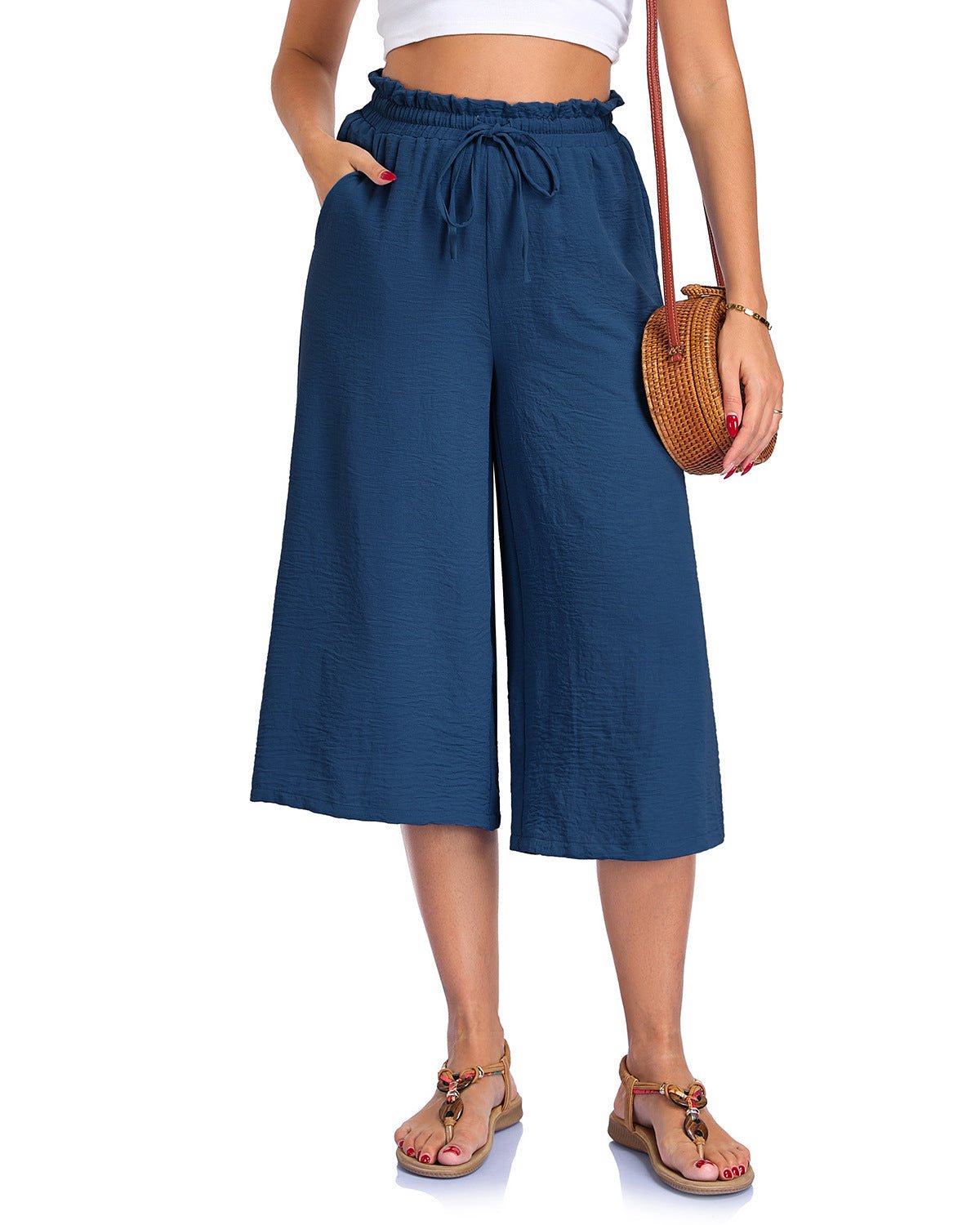Women’s elastic cropped wide-leg pants by FitiqueFit, casualwear with a relaxed fit and comfortable waistband, shown on a model.