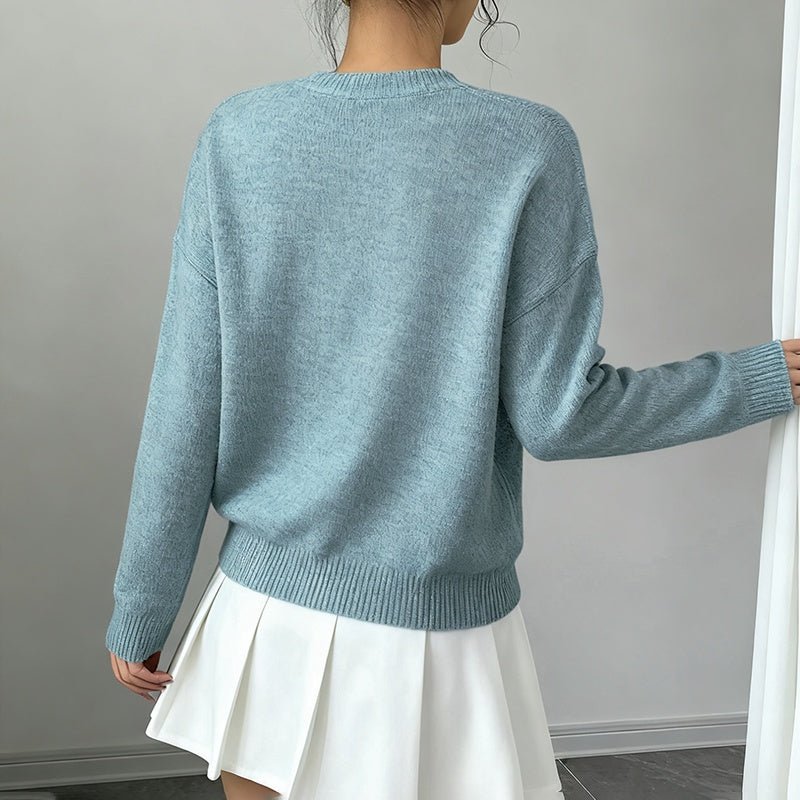Women's floral sweater by FitiqueFit featuring a crew neck, long sleeves, and an elegant casual pullover design.